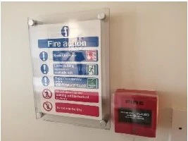 Fire action sign and fire alarm