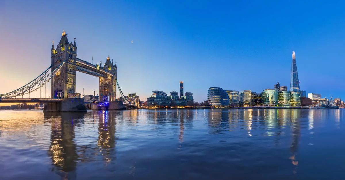 A landscape image of central London and the London bridge.